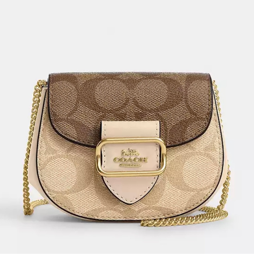 Signature coated canvas and smooth leather
Inside multifunction pocket